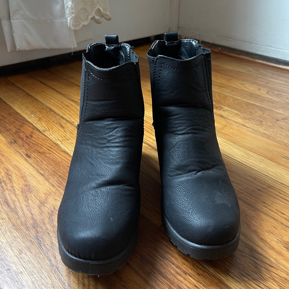 Woman’s black able boots, rubber sole with 3” heels